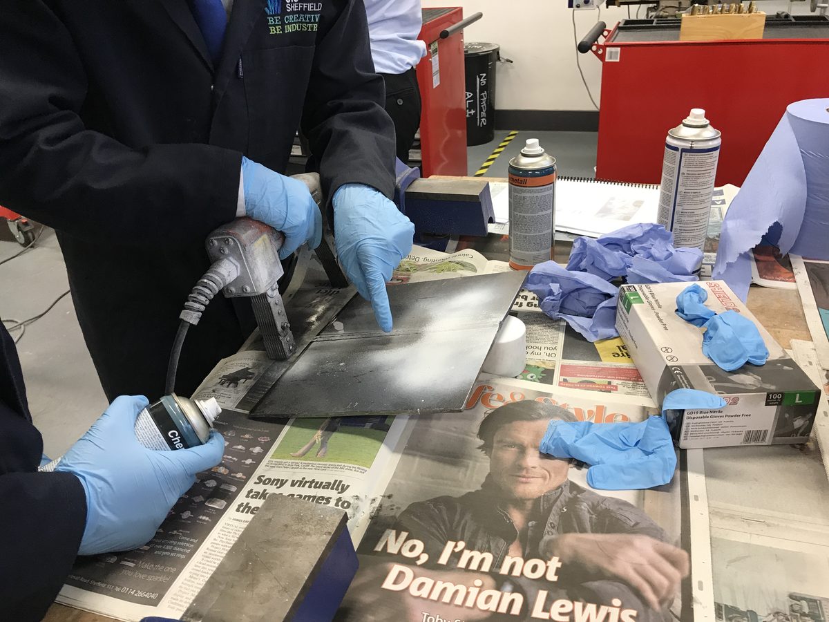 Students undergoing penetrant testing
